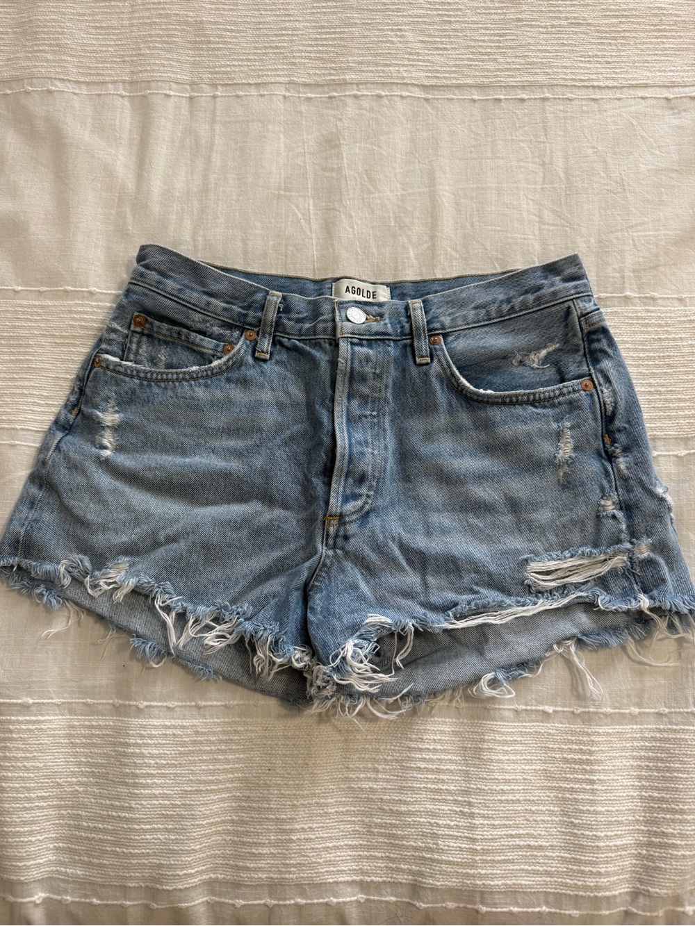 Agolde Faded Light Blue Distressed Denim Shorts